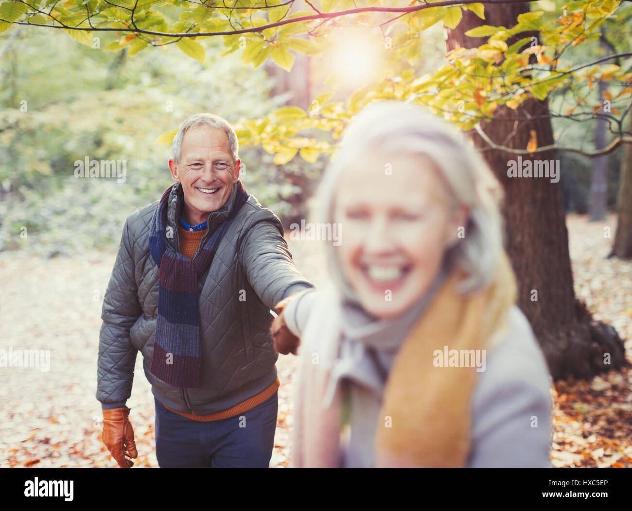 Holding hands leading senior hi-res stock photography and images - Alamy