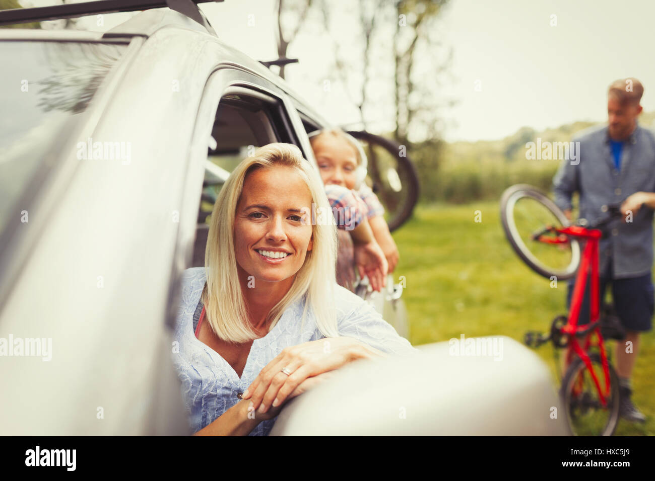 Portrait smiling mother and daughter in car Stock Photo