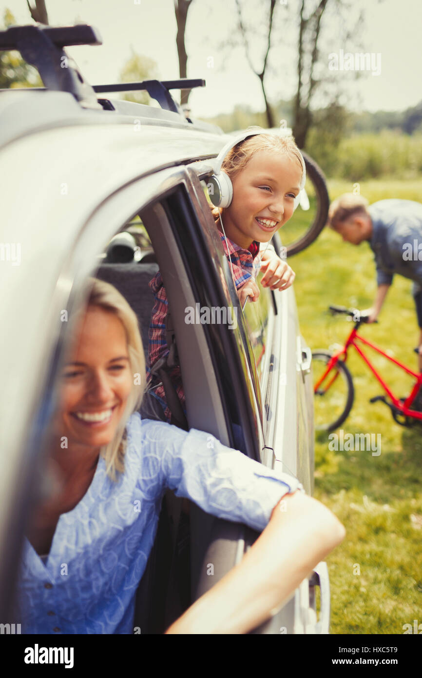 Happy mother and daughter in car Stock Photo