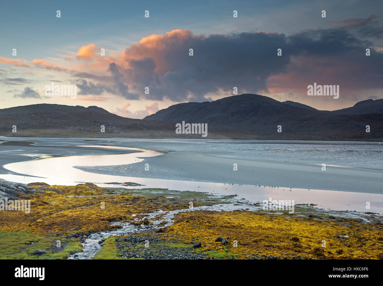 Clouds over tranquil mountains and ocean, Luskentyre Beach, Harris, Outer Hebrides Stock Photo