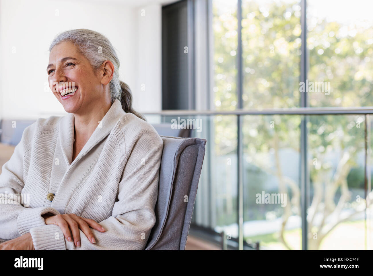 Mature woman laughing hi-res stock photography and images - Alamy