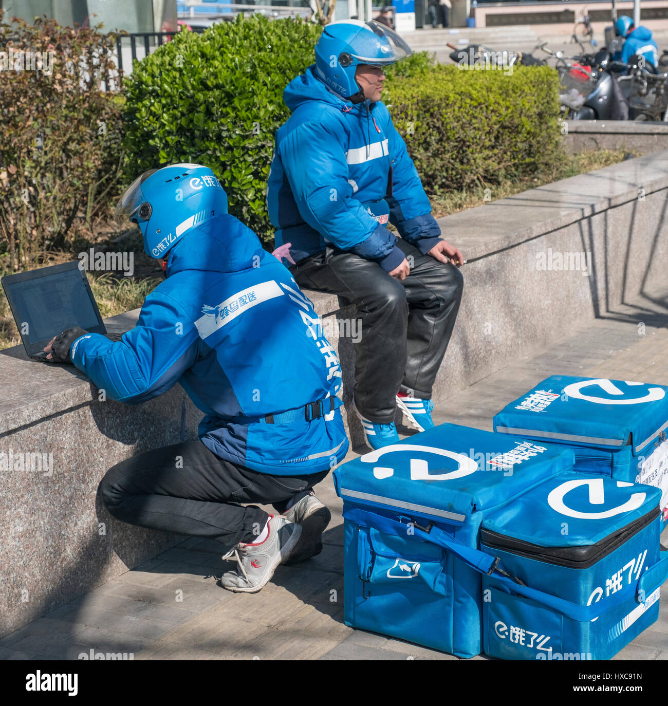 Chinese delivery man hires stock photography and images Alamy