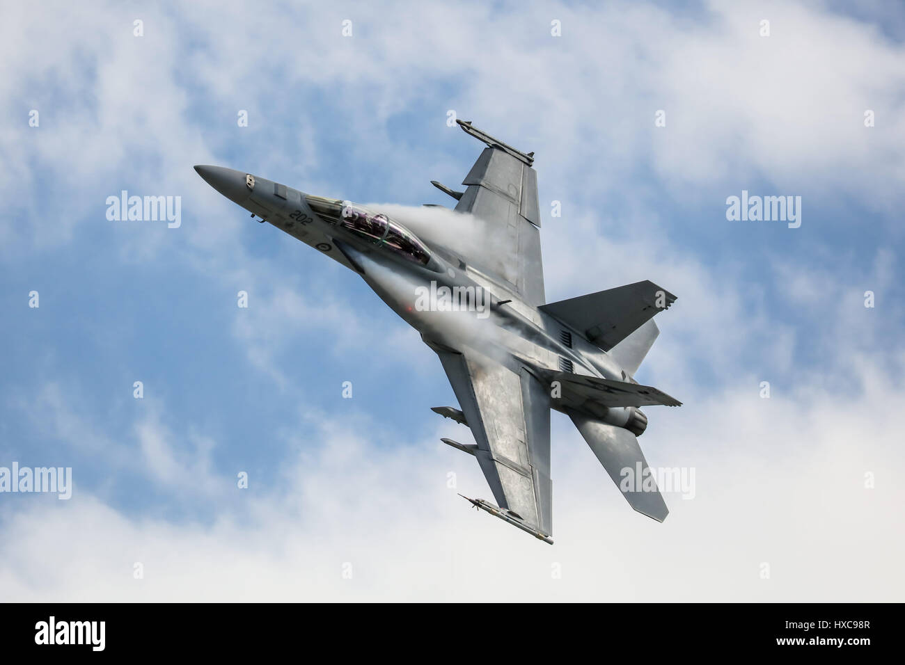 MELBOURNE, AUSTRALIA - MARCH 25: An Royal Australian Air Force FAA18F Super Hornet performs in a public display above Melbourne on March 25, 2017 Stock Photo
