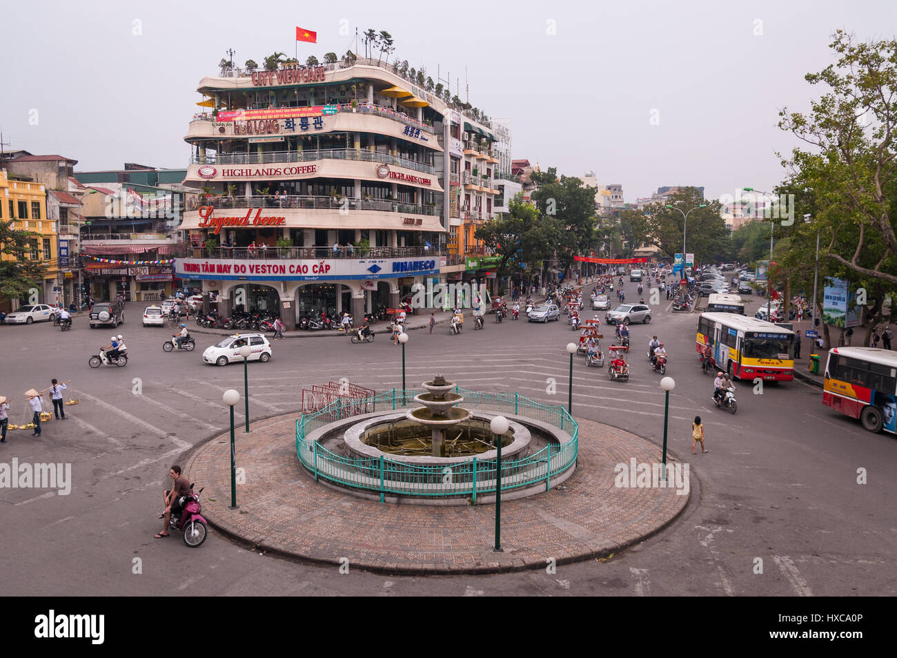 The Highlands Coffee building at Dong Kinh Nghia Thuc Square roundabout junction in Hanoi city, Vietnam Stock Photo
