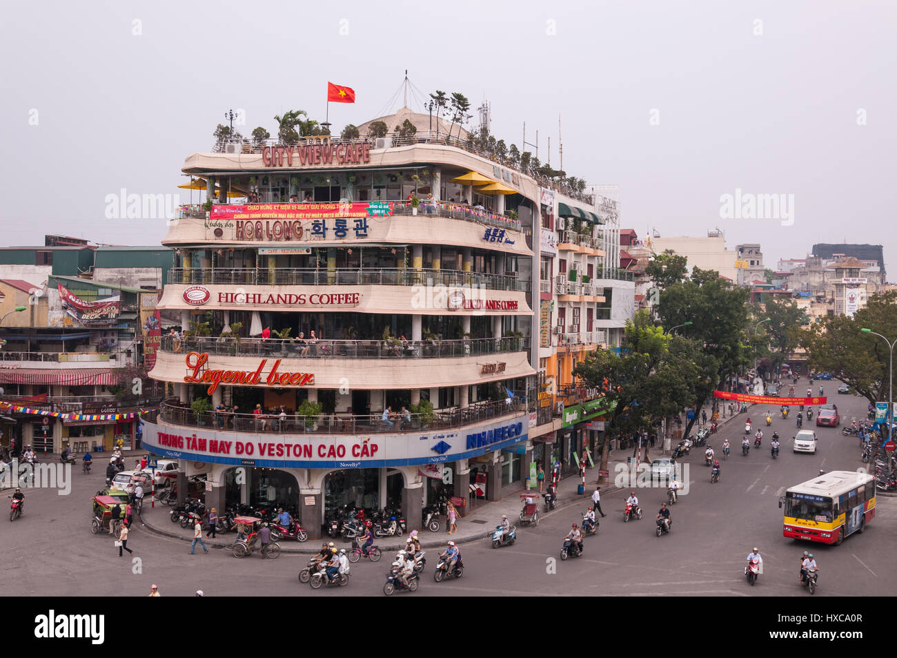 The Highlands Coffee building at Dong Kinh Nghia Thuc Square roundabout junction in Hanoi city, Vietnam Stock Photo