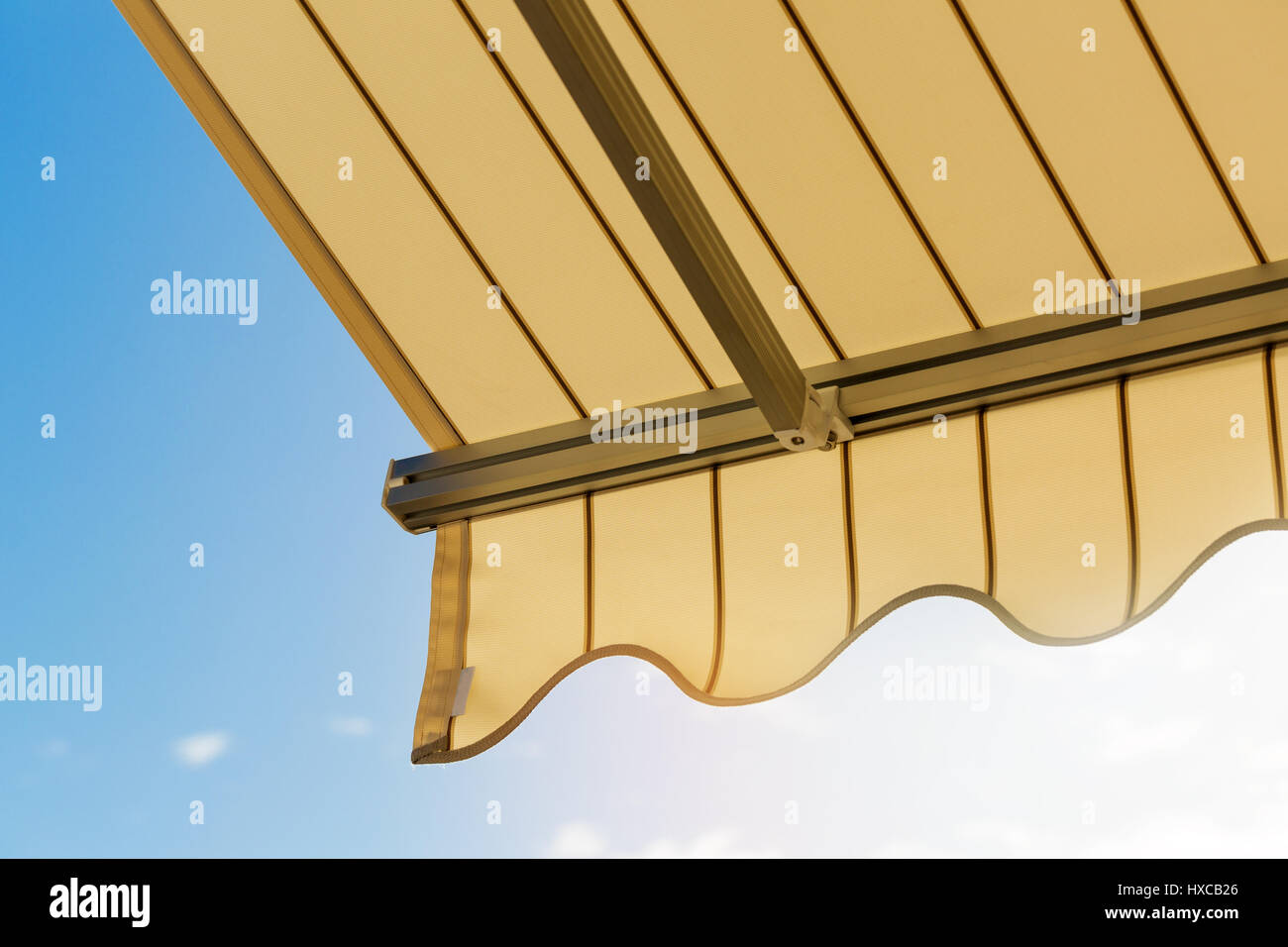 sun protection - awning against blue sky Stock Photo