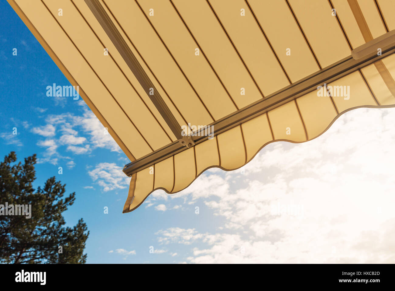 awning against blue sunny sky Stock Photo
