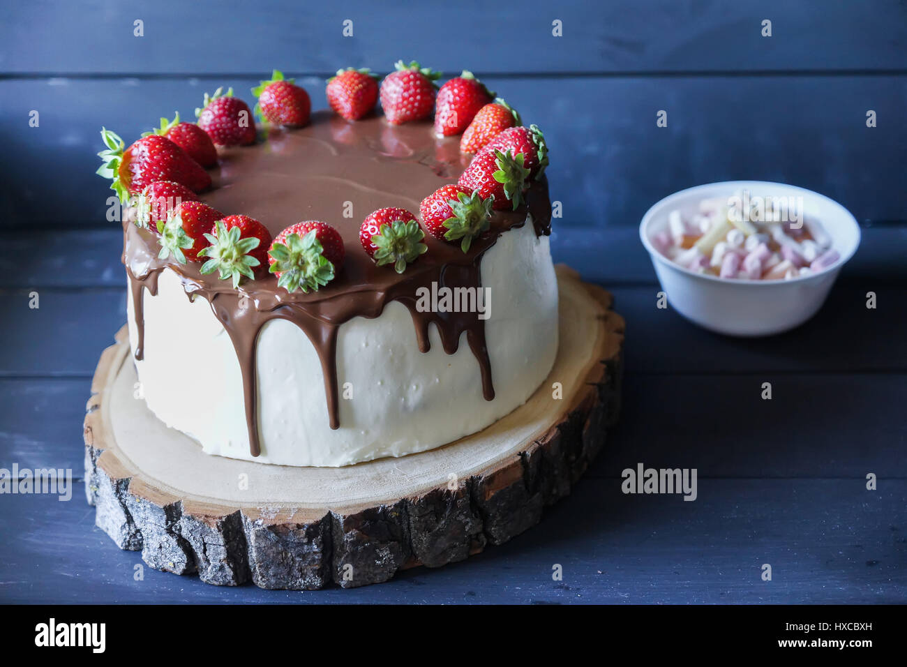 Delicious cake with fresh strawberry and dark chocolate decoration ...