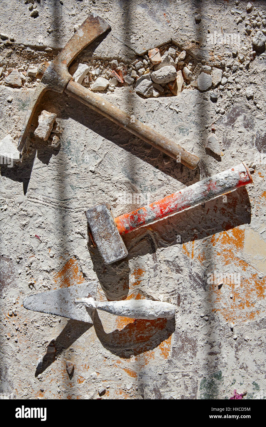 Mason tools on debris background in house improvement construction Stock Photo Alamy