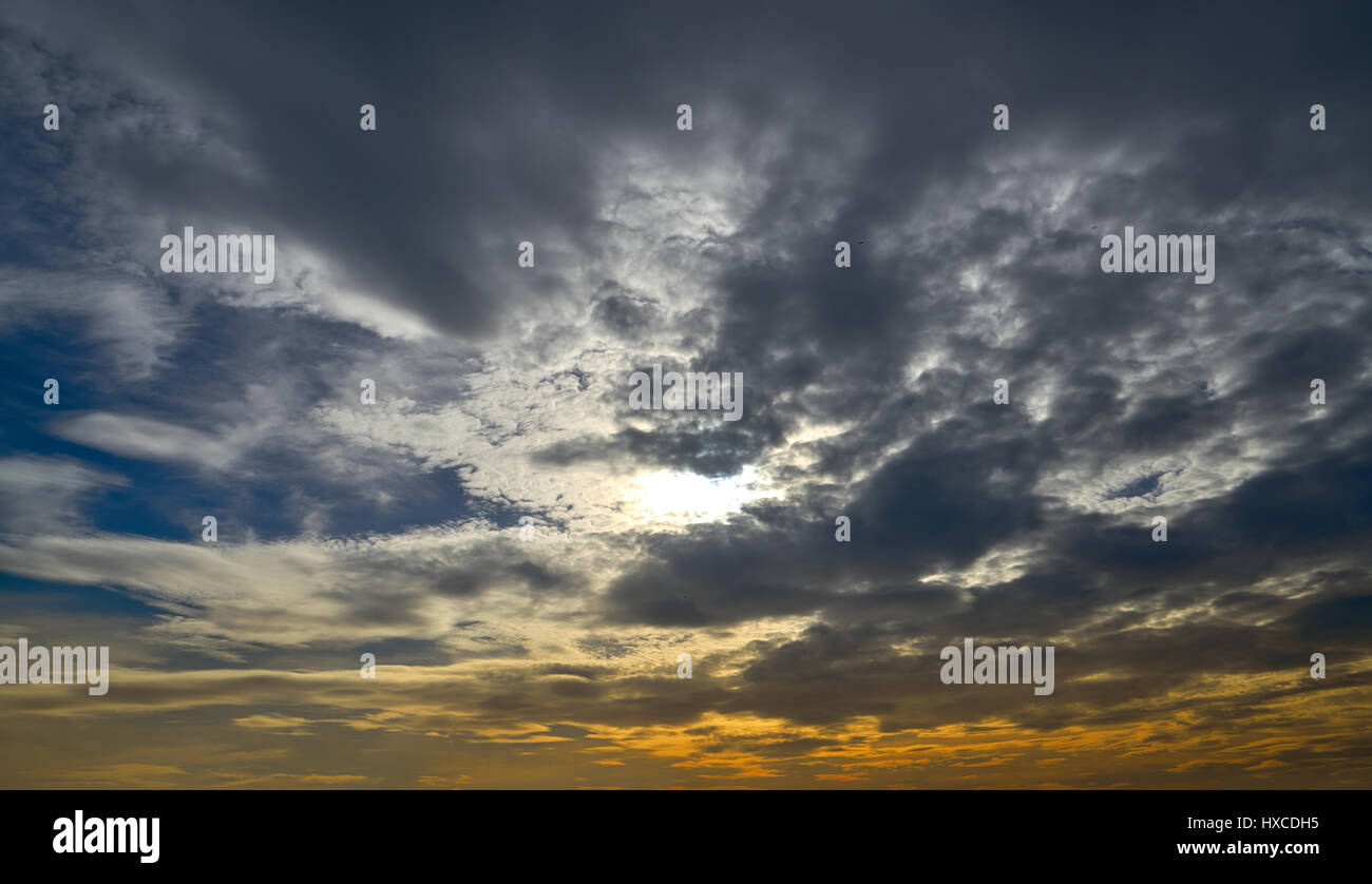 sunset dusk cloudy sky at dusk with dramatic colors Stock Photo