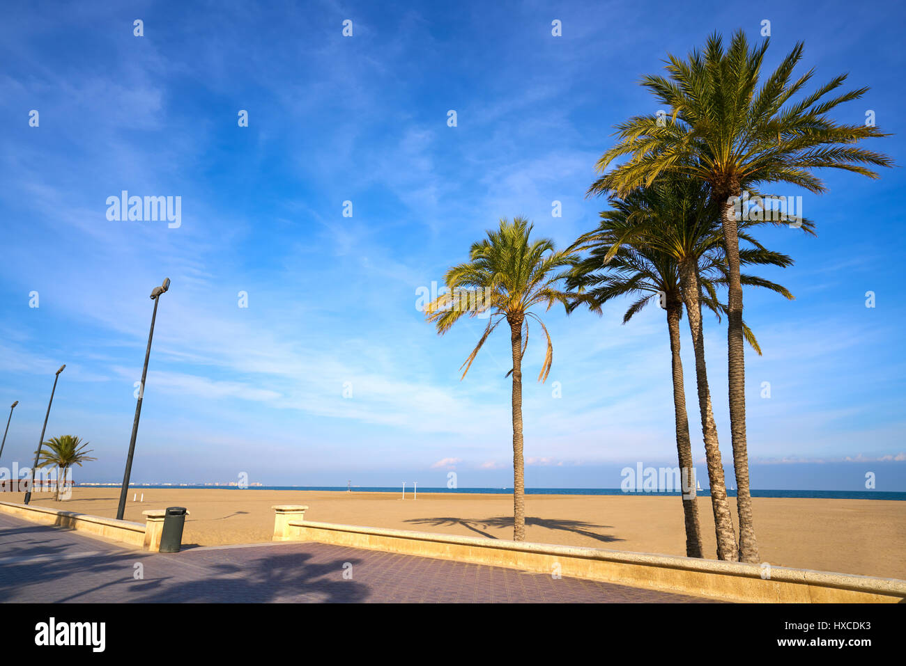 Valencia La Malvarrosa beach arenas palm trees in Spain Stock Photo Alamy