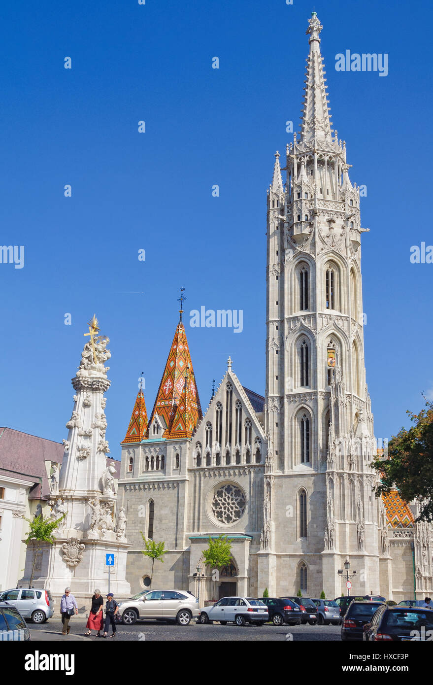 Matthias Church and the Statue of Holy Trinity in Budapest, Hungary Stock Photo