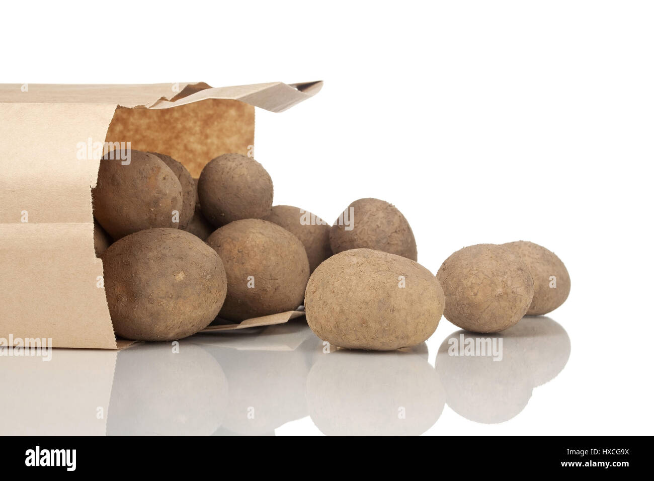 Potatoes in a paper bag, Potatoes in a paper bag |, Kartoffeln in einer Papiertuete |Potatoes in a paper bag| Stock Photo