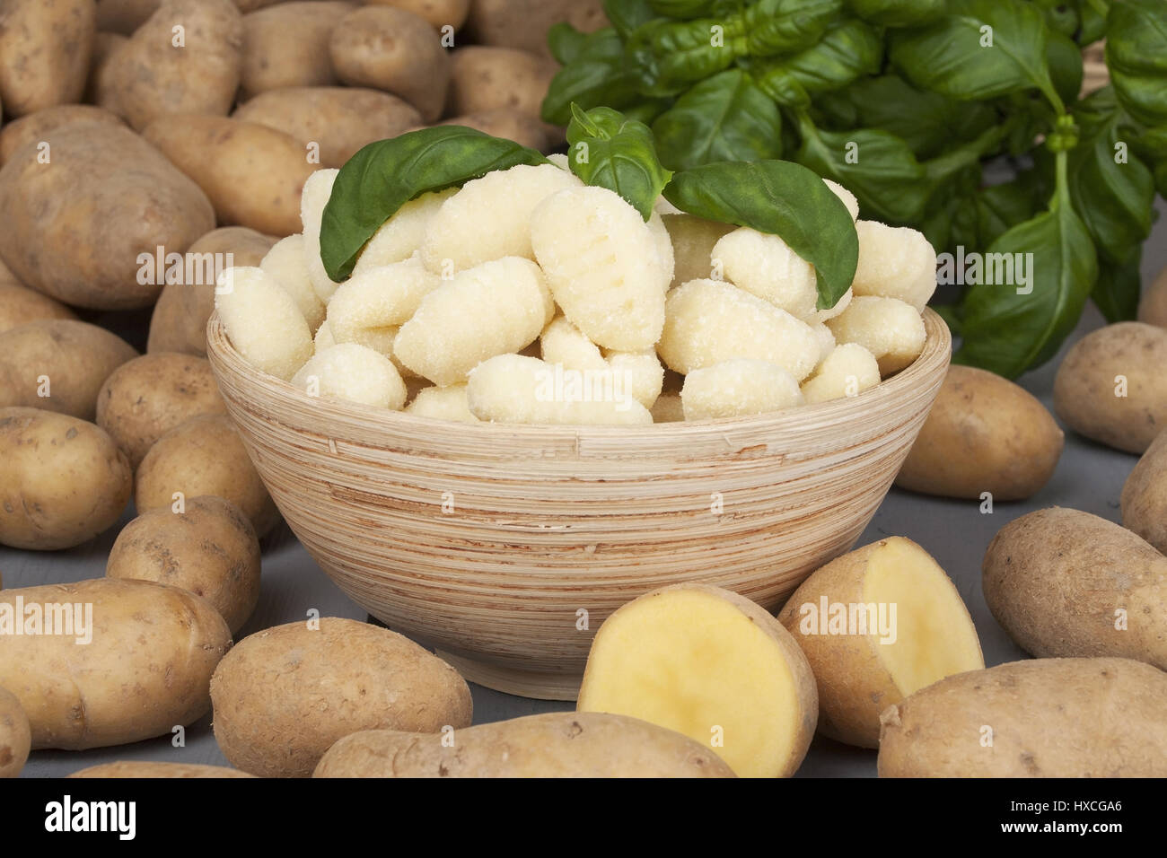 Gnocchis bowl in a bowl and potatoes, Gnocchi in an and potatoes |, Gnocchis in einer Schale und Kartoffeln |Gnocchi in a bowl and potatoes| Stock Photo