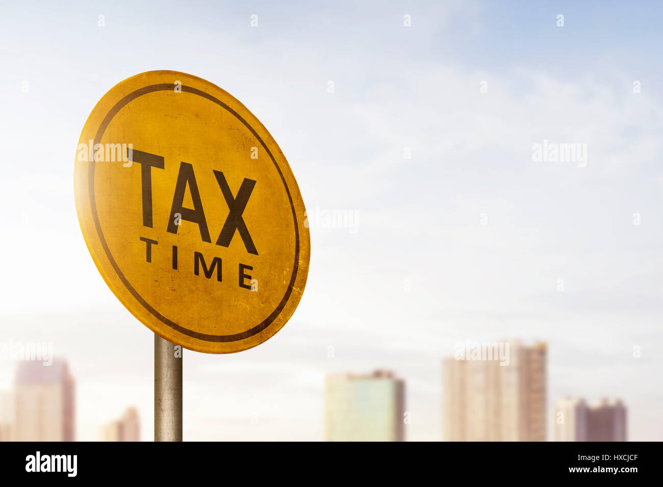 Tax time announcement on road sign with sky background Stock Photo Alamy