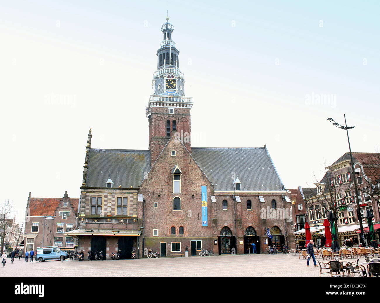 De Waag (Weighing house) at Waagplein square in Alkmaar, The Netherlands. One of the very few remaining weigh houses still in use. Stock Photo