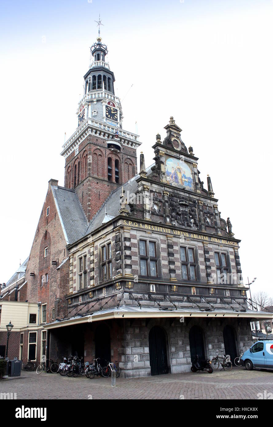 De Waag (Weighing house) at Waagplein square in Alkmaar, The Netherlands. One of the very few remaining weigh houses still in use. Stock Photo