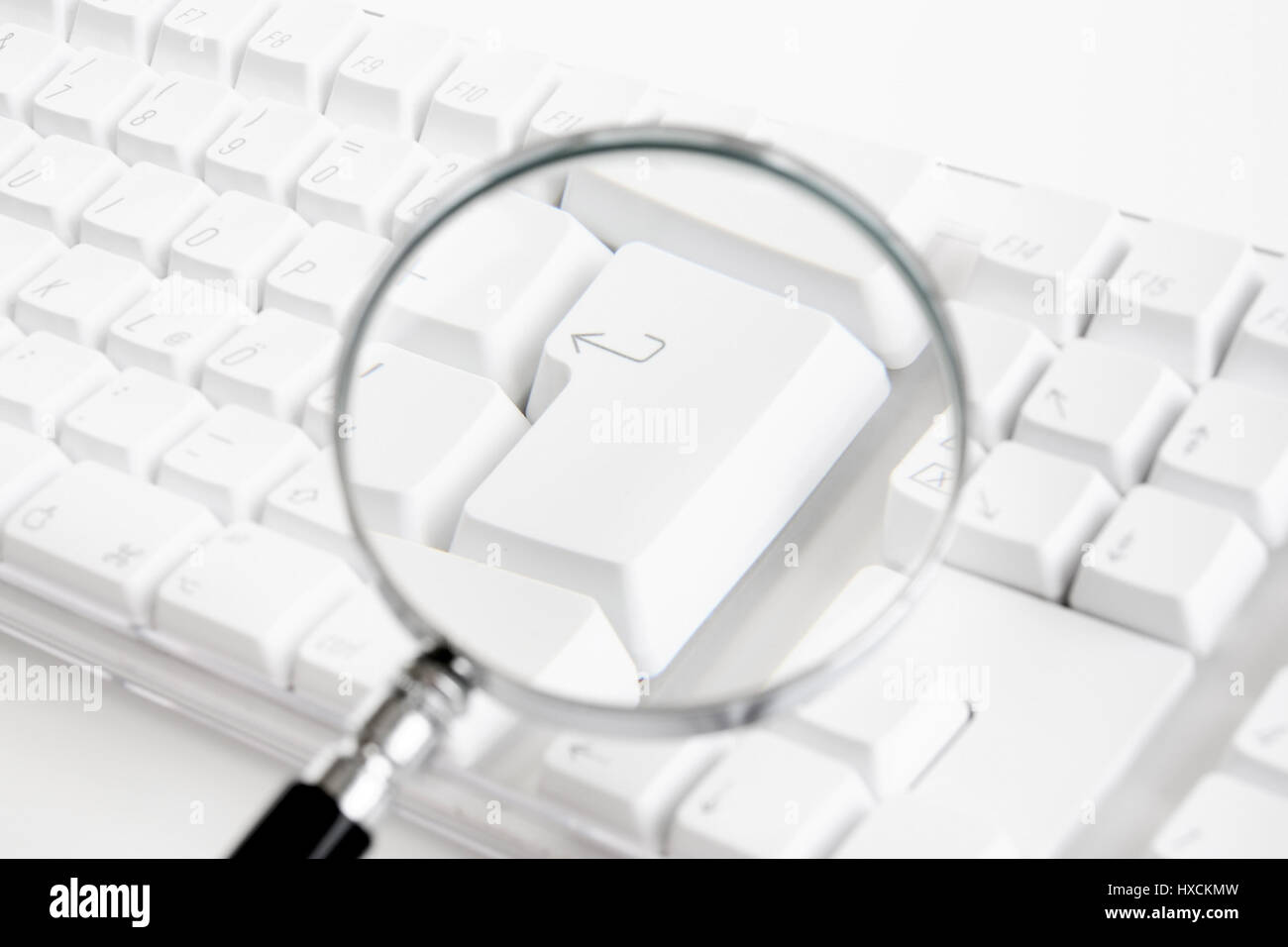 Keyboard with magnifying glass, Tastatur mit Lupe Stock Photo Alamy