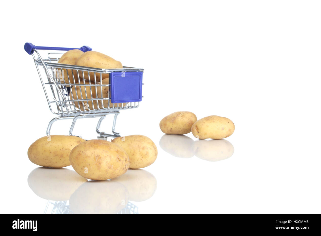 Shopping carts and potato, Einkaufswagen und Kartoffel Stock Photo