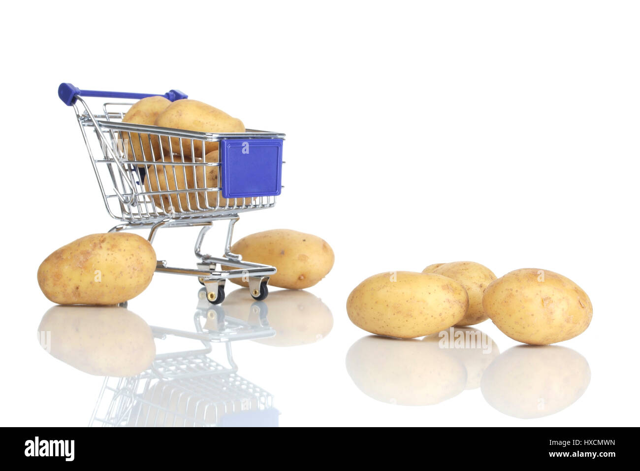 Shopping carts and potato, Einkaufswagen und Kartoffel Stock Photo