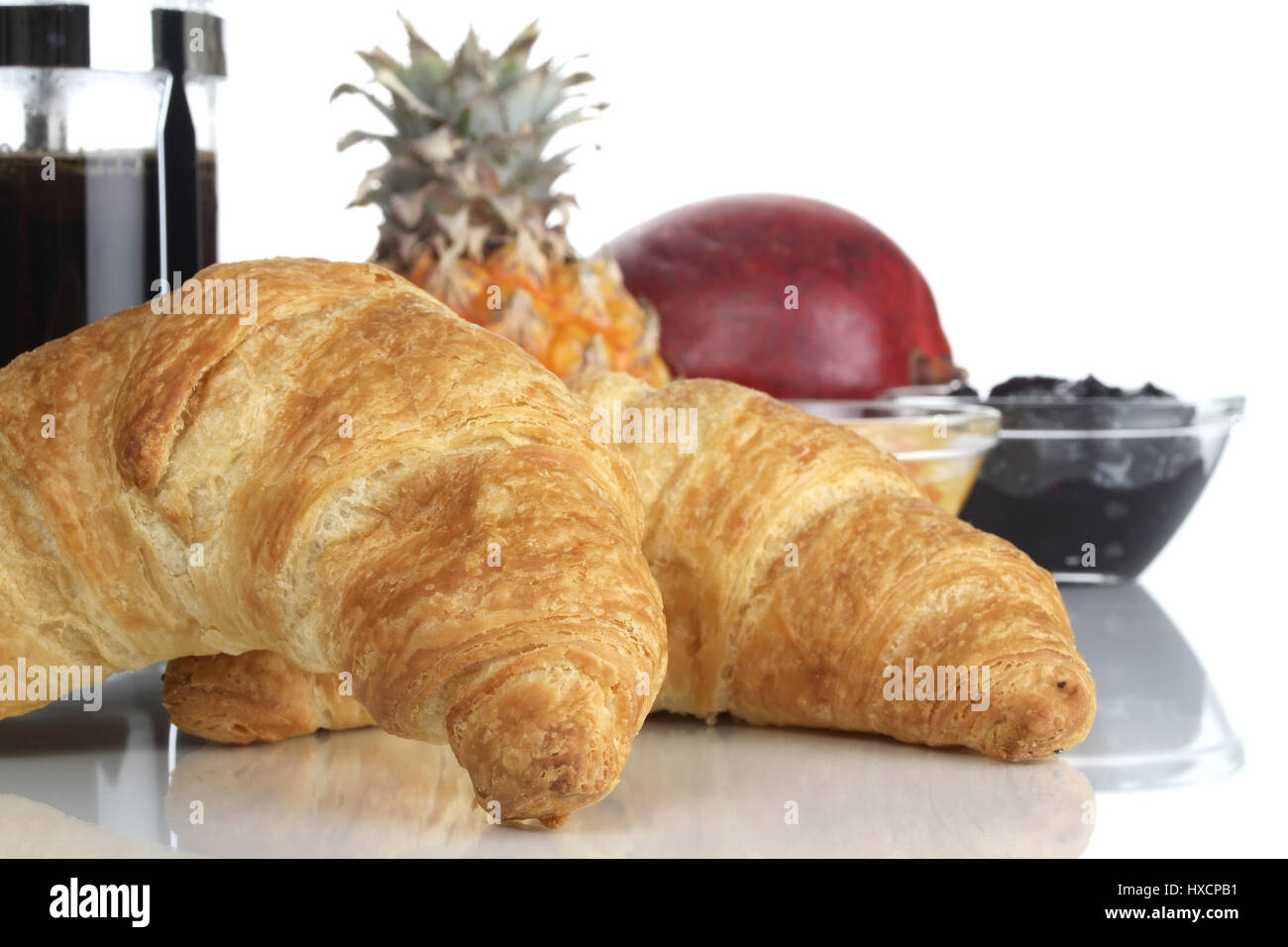Croissants, coffee, fruit and jam, Kaffee, Frucht und Marmelade Stock Photo