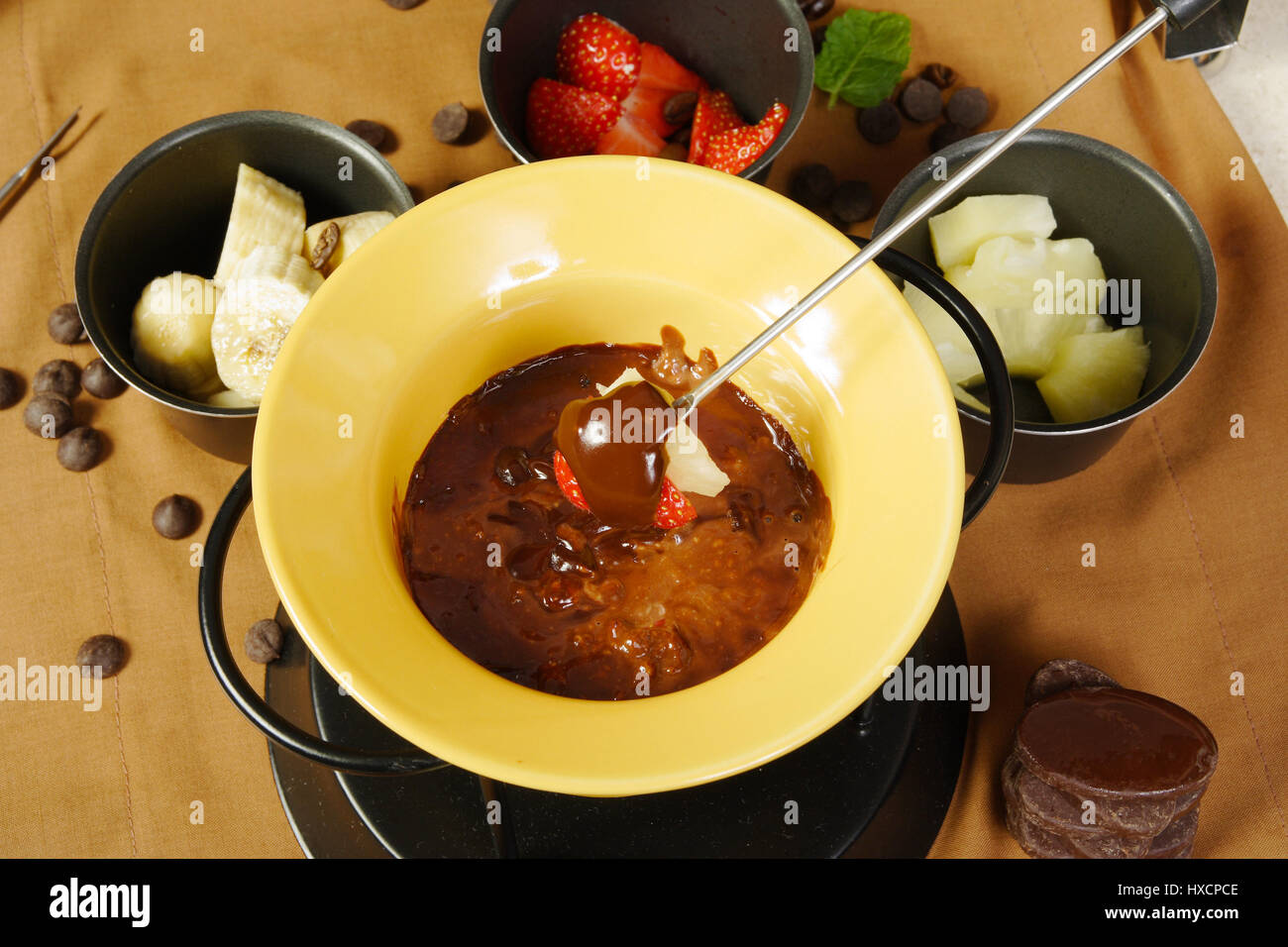 Chocolate fondue and fruit Stock Photo Alamy