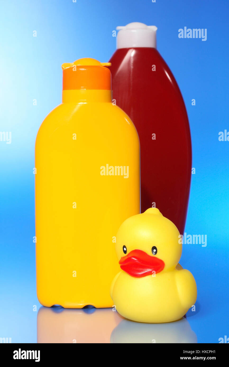 Solar milk, lotion and elastic duck, Sonnenmilch, Lotion und Gummiente Stock Photo