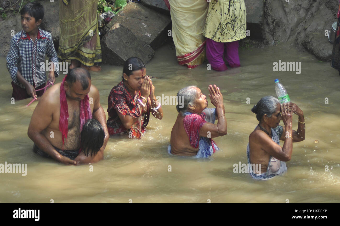 Agartala, India. 26th Mar, 2017. Traditional Holi bath in India, Baruni ...