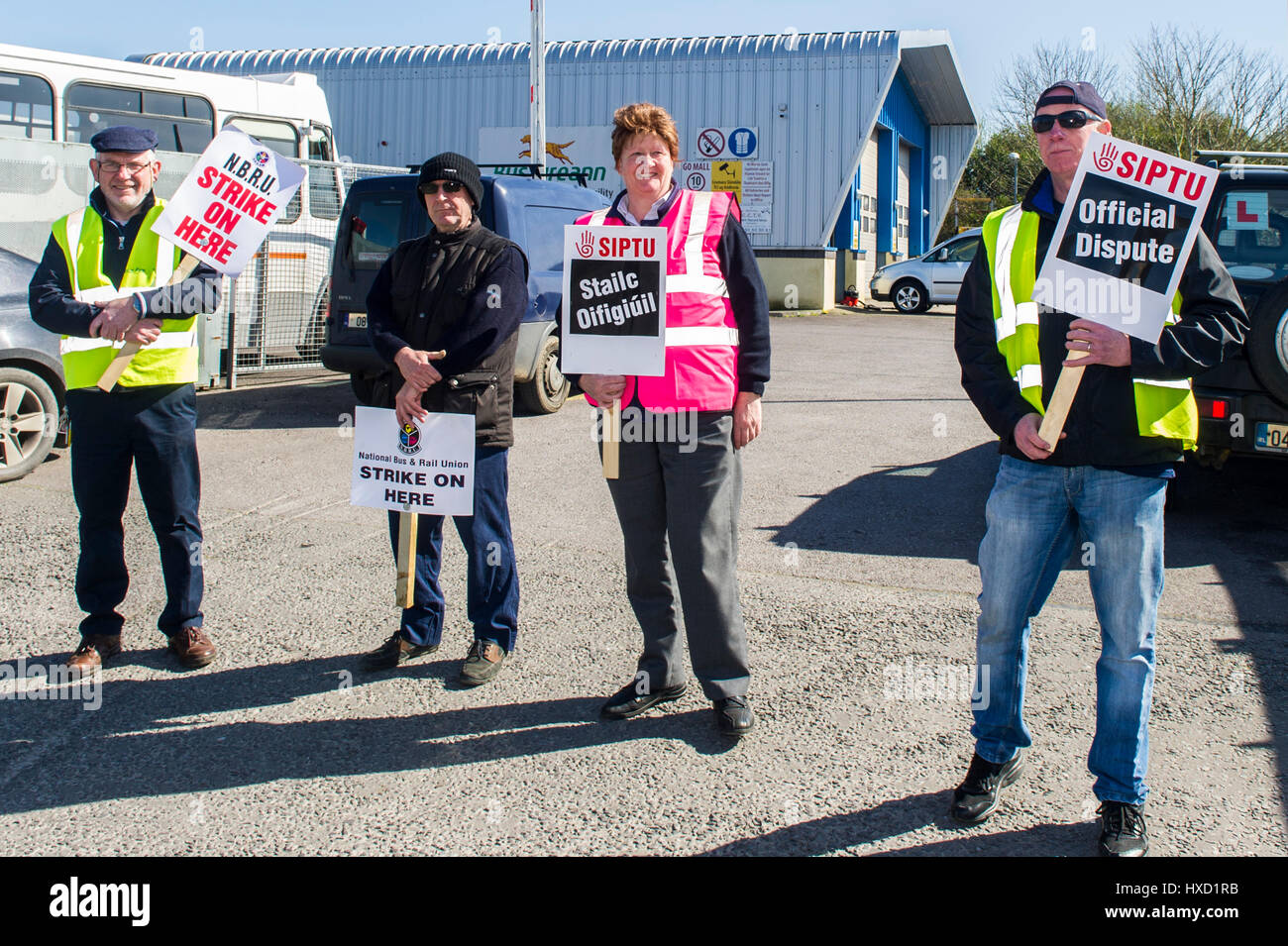 Skibbereen, Ireland. 27th Mar, 2017. Bus drivers, who are members of the NBRU and SIPTU unions, formed a picket line today at the bus depot in Skibbereen as part of the official national all-out, indefinite strike. Bus Eireann wants to impose new terms and conditions, cut overtime and the shift allowance and reduce weekend bonus pay. Bus Eireann claims the company will be insolvent within weeks if cost cutting measures aren't implemented immediately. Credit: Andy Gibson/Alamy Live News Stock Photo