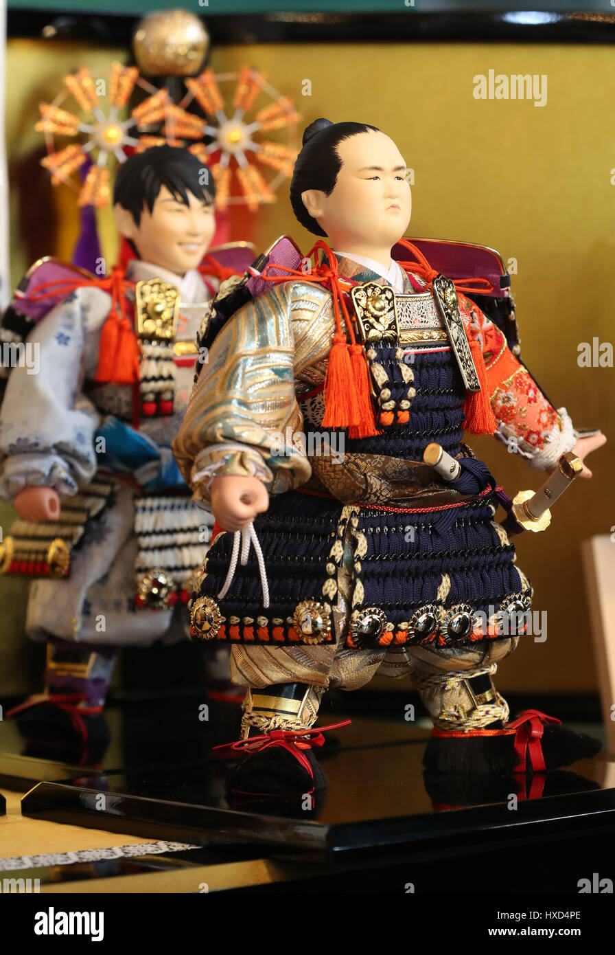 Tokyo, Japan. 28th Mar, 2017. Japanese doll maker Kyugetsu unveils a samurai doll of sumo grand