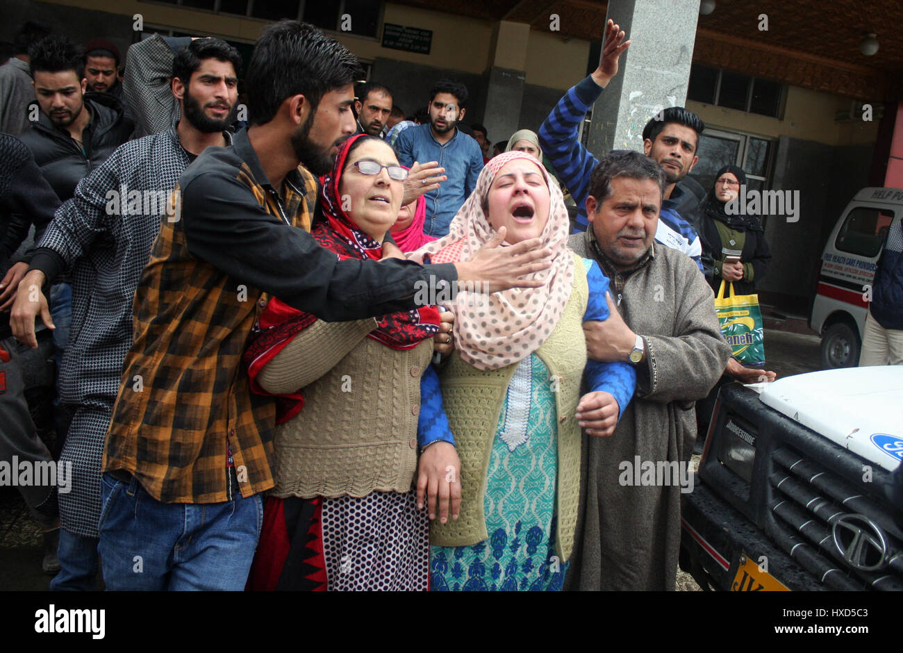 Srinagar, Kashmir. 28th March 2017.Relatives weeps in side the hospital after received the body .One person was killed and four others were injured today in security forces' action against stone-pelting protesters near the encounter site in Chadoora area of central Kashmir's Budgam district.Security forces launched a cordon and search operation in Durbugh area of Chadoora in the early hours following information about the presence of terrorists in the area, a police official said. Credit: Sofi Suhail/Alamy Live News Stock Photo