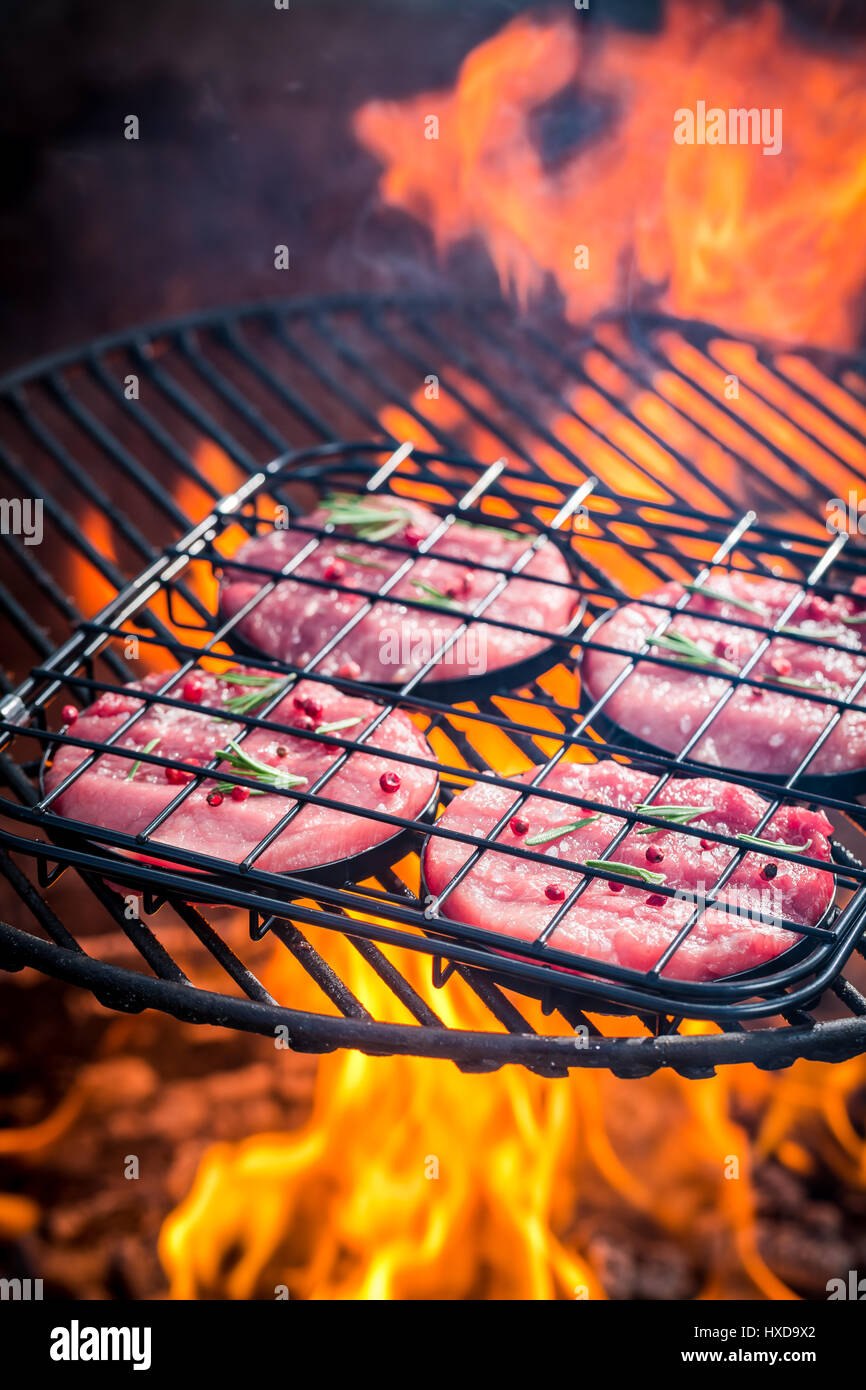 Red Meat With Rosted Roasting red beef with rosemary and pepper on grill Stock Photo - Alamy