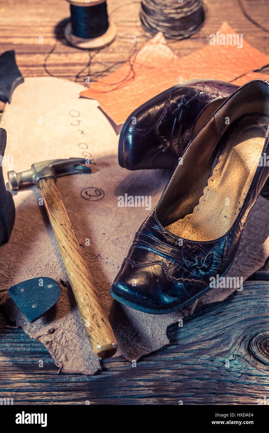 Vintage shoemaker workplace tools hi-res stock photography and images ...