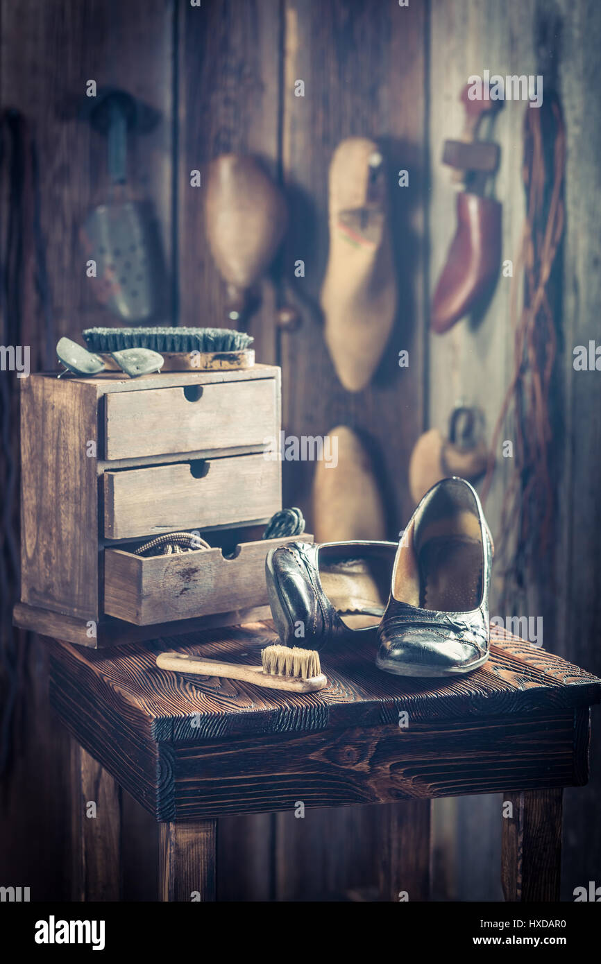 Old shoemaker workshop with tools, leather and shoes Stock Photo - Alamy