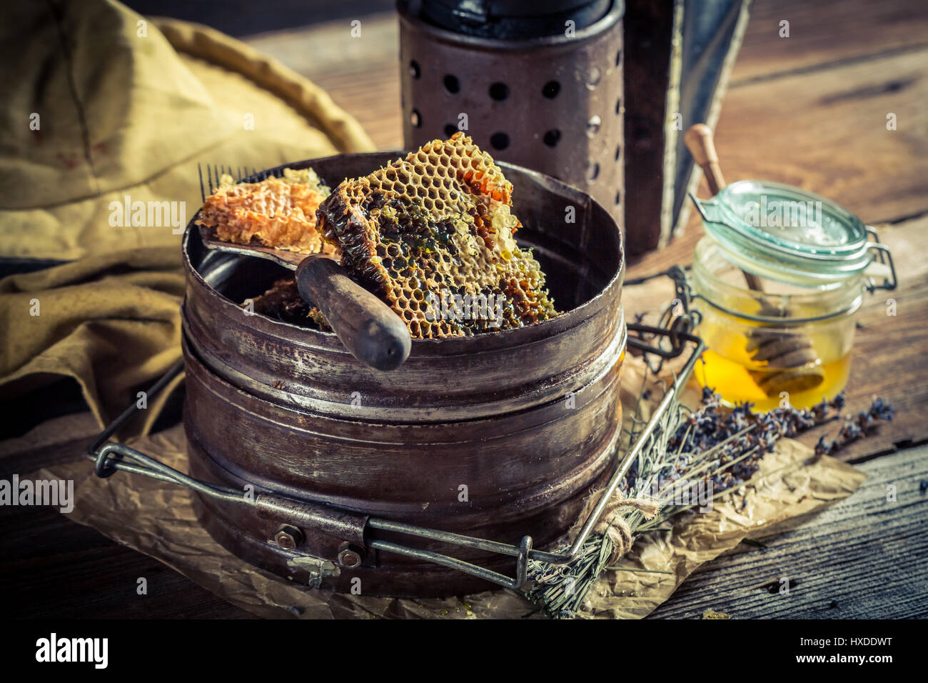 Vintage working tools for beekeeping with fresh honey Stock Photo - Alamy