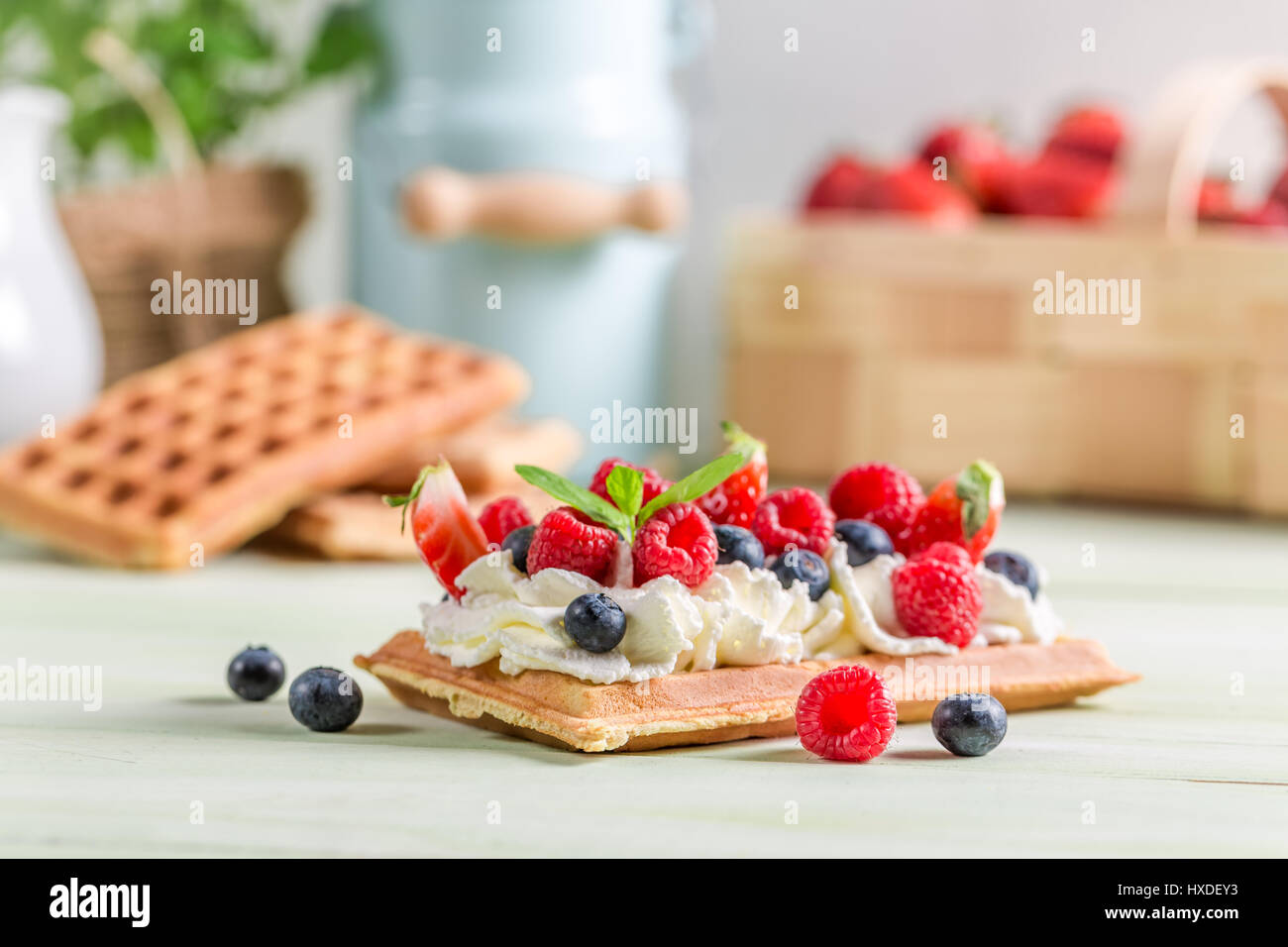 Waffle with berry fruit and whipped cream Stock Photo - Alamy