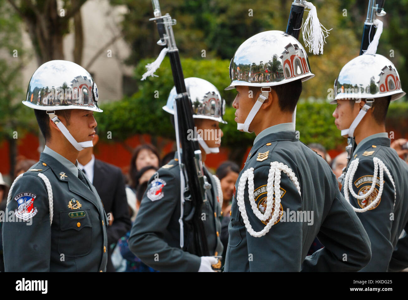 [Editorial Use Only] TAIPEI, TAIWAN: Changing of the Honor Guards with rifle and bayonet with tourist in the background Stock Photo