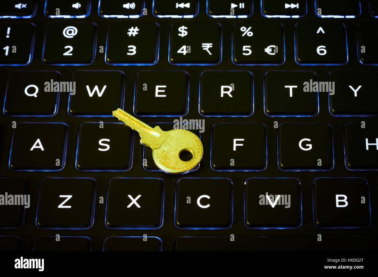 Key on a backlit computer keyboard Stock Photo