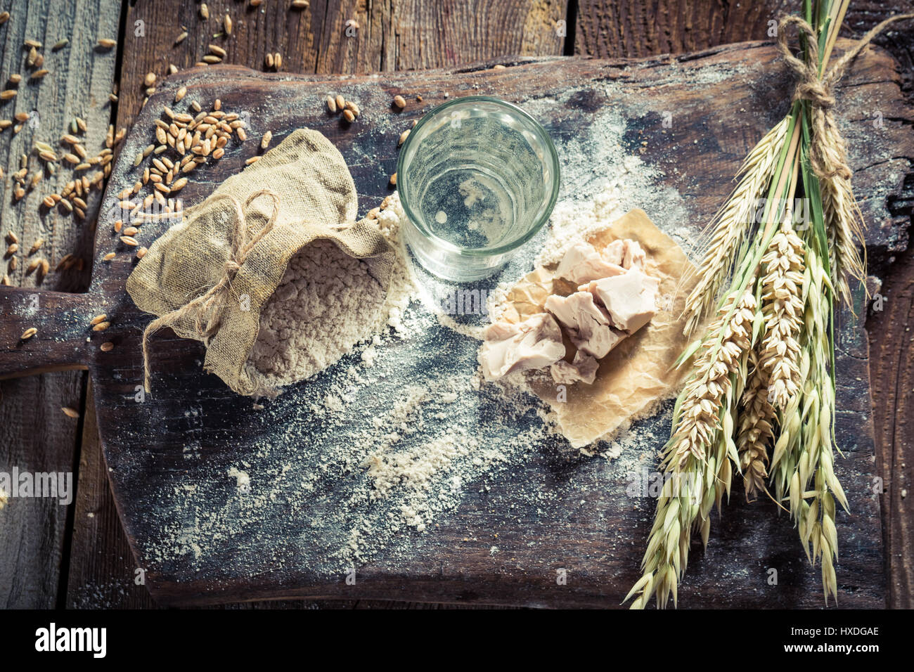 Flour, leaven, yeast and water on homemade bread Stock Photo Alamy