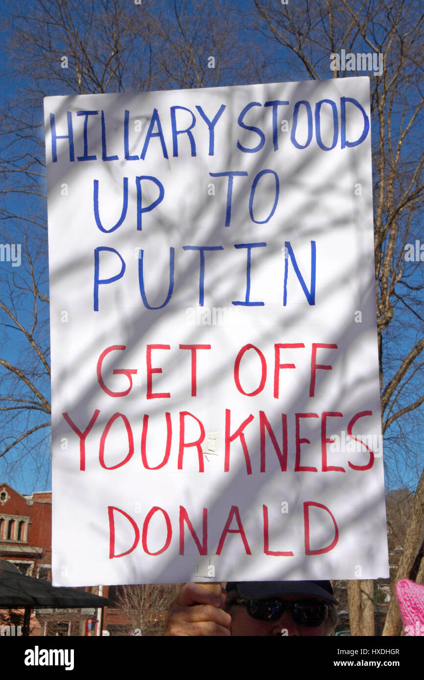 Asheville, North Carolina, USA - February 25, 2017: Close up of a large political sign saying 'Hillary Stood Up to Putin, Get Off Your Knees Donald' a Stock Photo