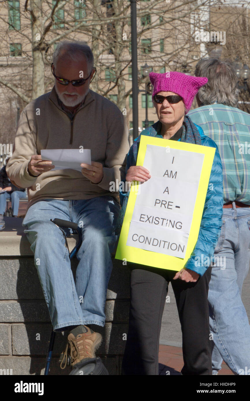 Senior Activists At an Affordable Care Rally  With SignSenior Activists At an Affordable Care Rally  With Sign Asheville, North Carolina, USA - Februa Stock Photo