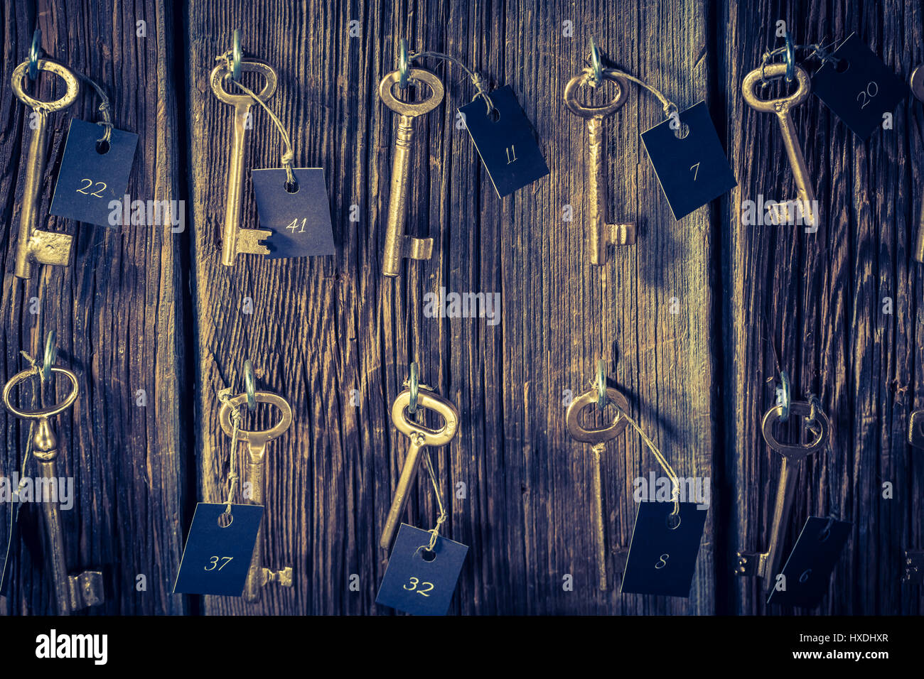 Vintage keys with number in hotel Stock Photo Alamy