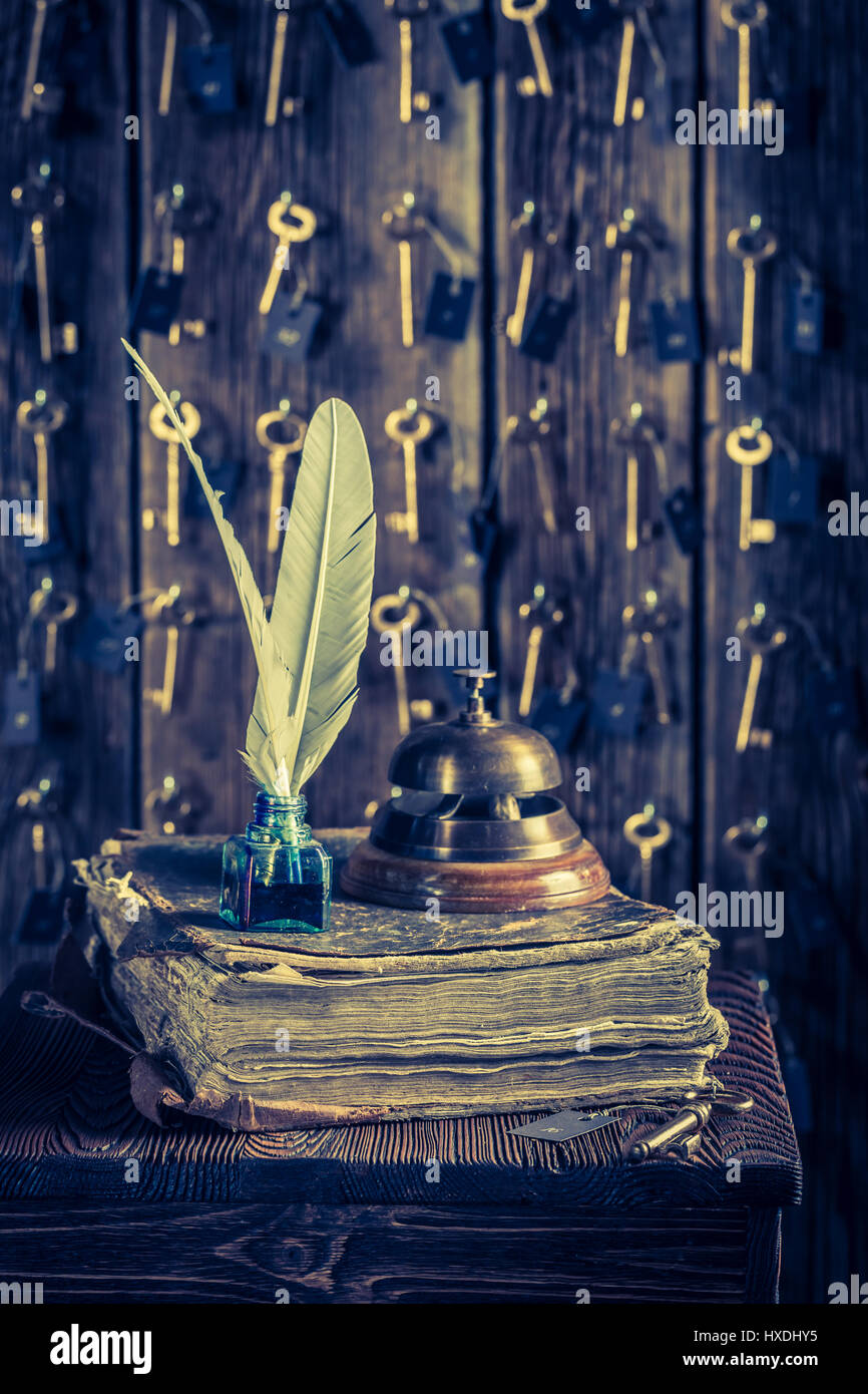 Guestbook and keys for rooms in vintage reception in hotel Stock Photo Alamy