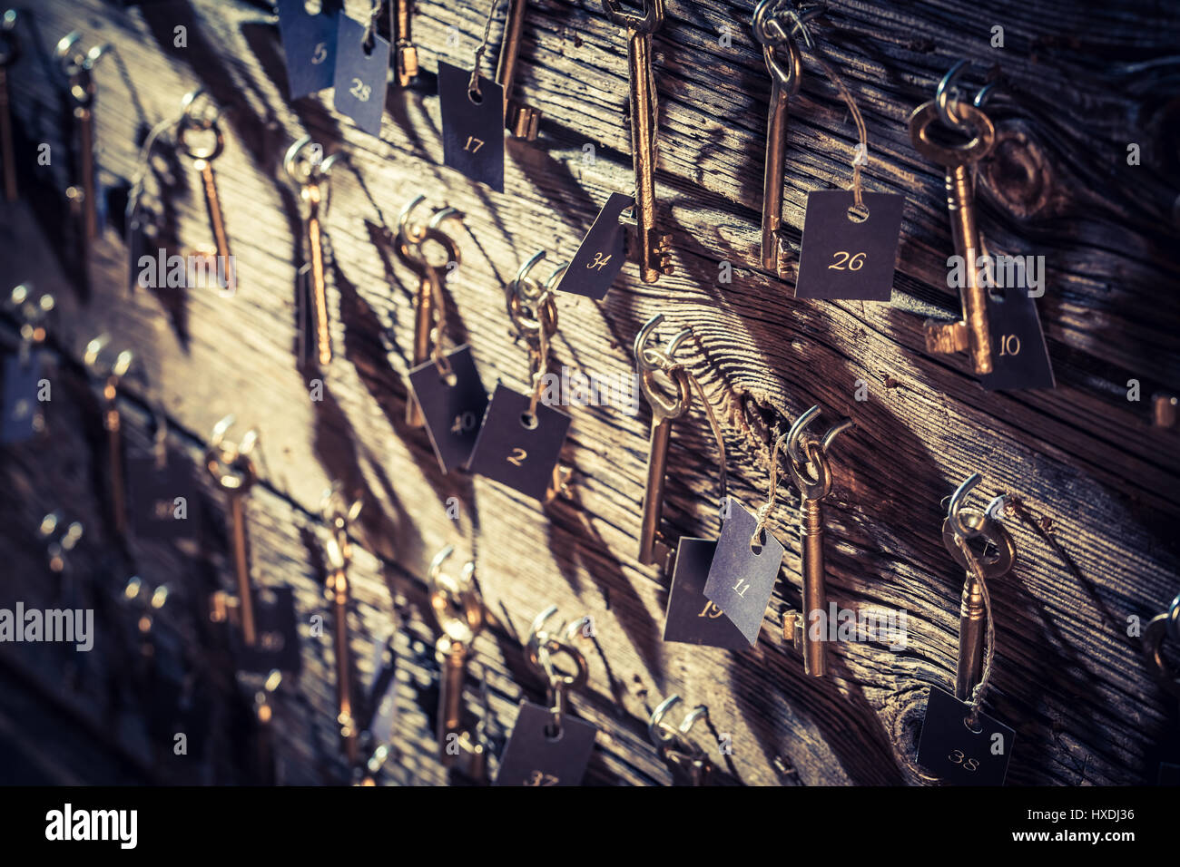 Vintage hotel with keys for rooms Stock Photo Alamy
