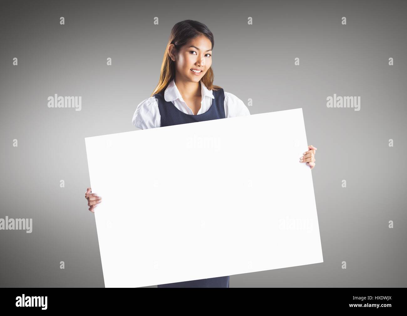 digital composite of business woman with large blank card
