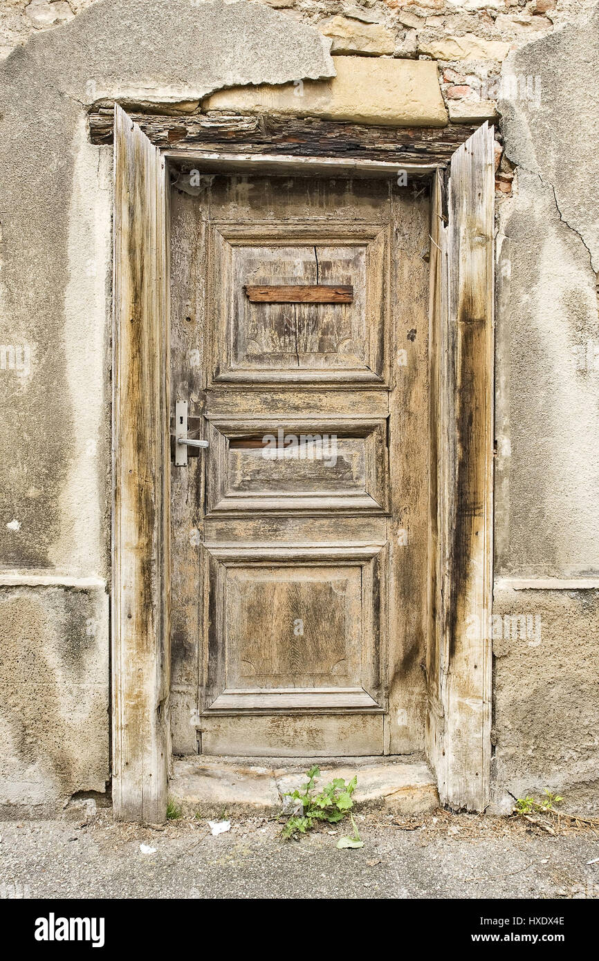 Old and ailing front door, Old and dilapidated doorstep |, Alte und marode Haustür |Old and dilapidated doorstep| Stock Photo
