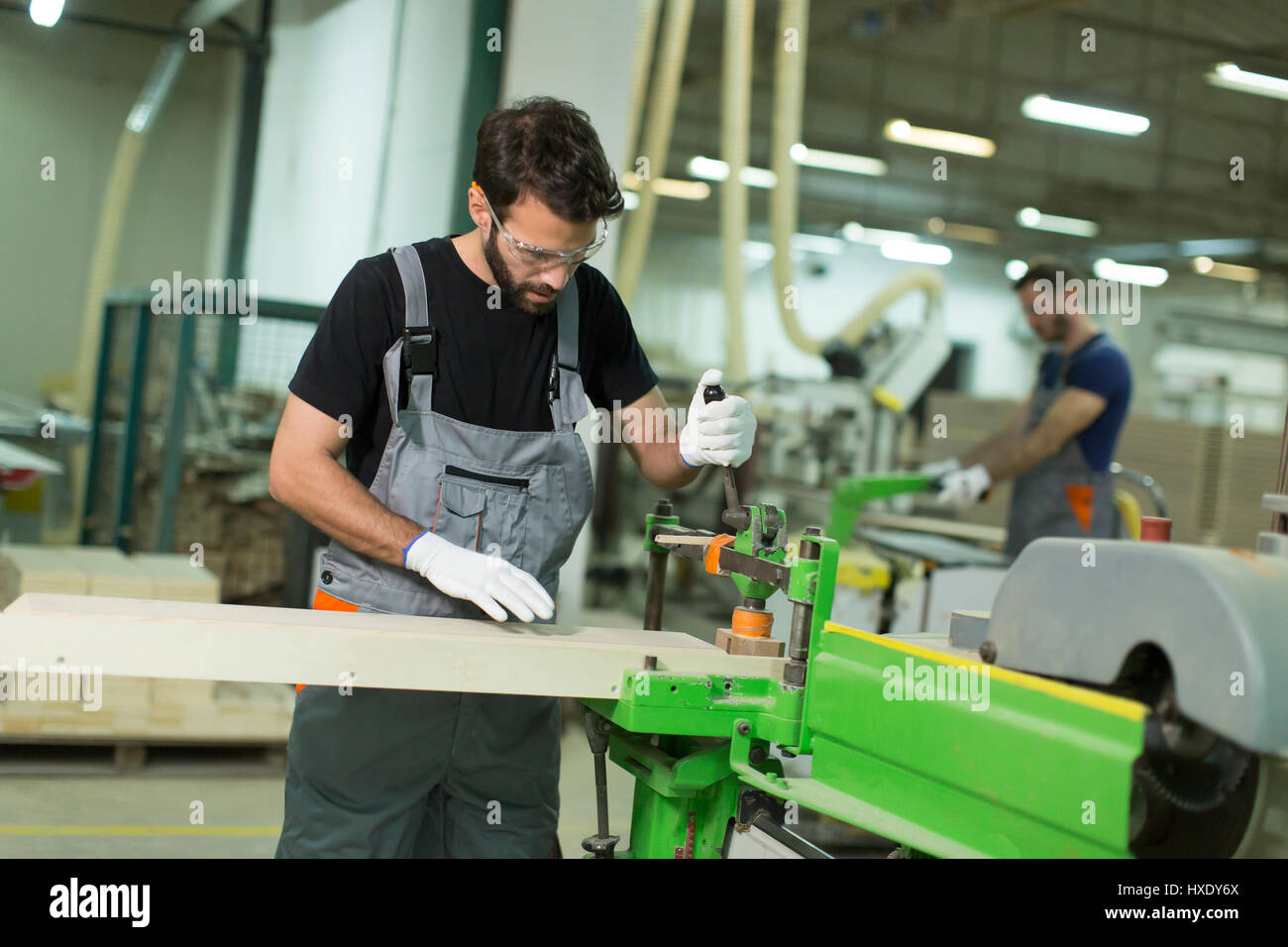 Two handsome young men working in lumber Stock Photo Alamy