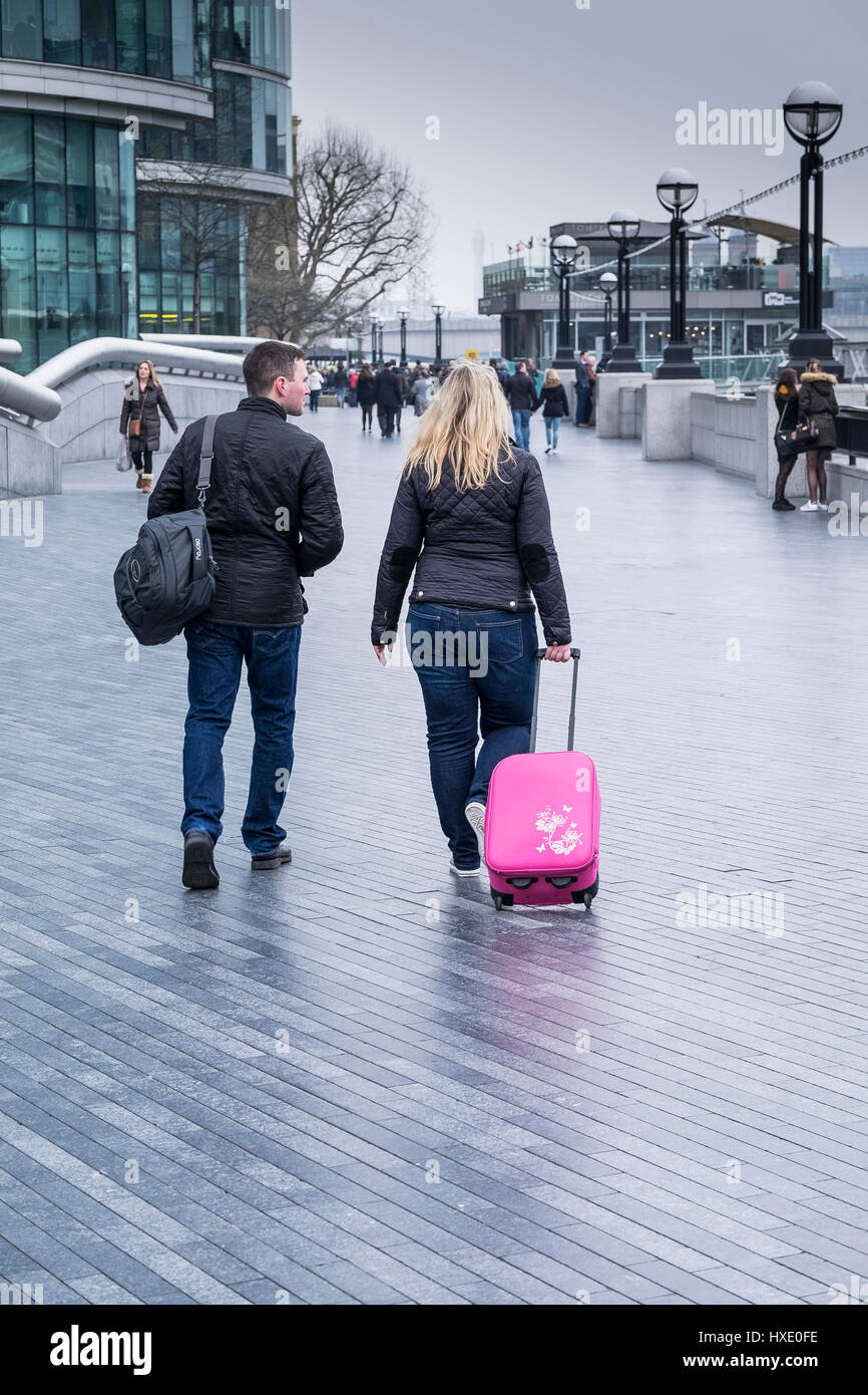 Queens Walk London Southbank South Bank Couple People Walking Suitcase Tourists Tourism Stock Photo