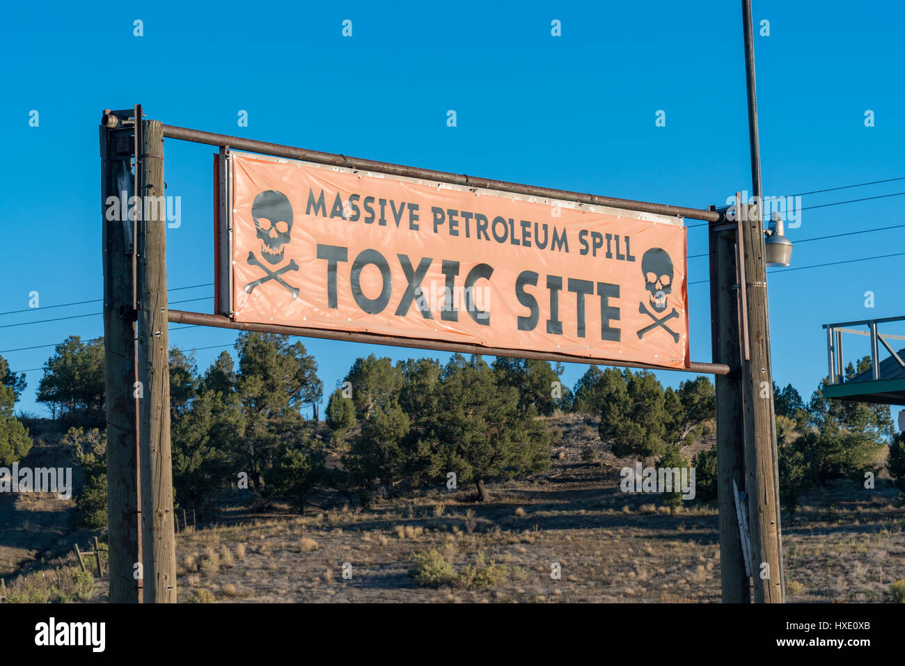 Toxic Site sign at petroleum spill Stock Photo
