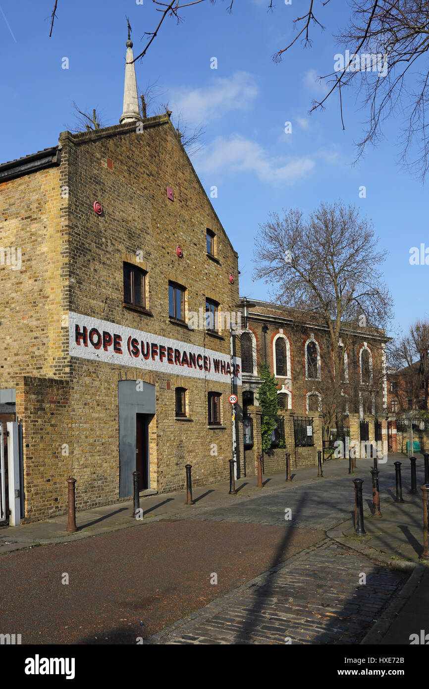 Hope Sufferance Wharf. Refurbished Victorian warehouses in Rotherhithe, East London, UK. Next to the church of St Mary the Stock Photo